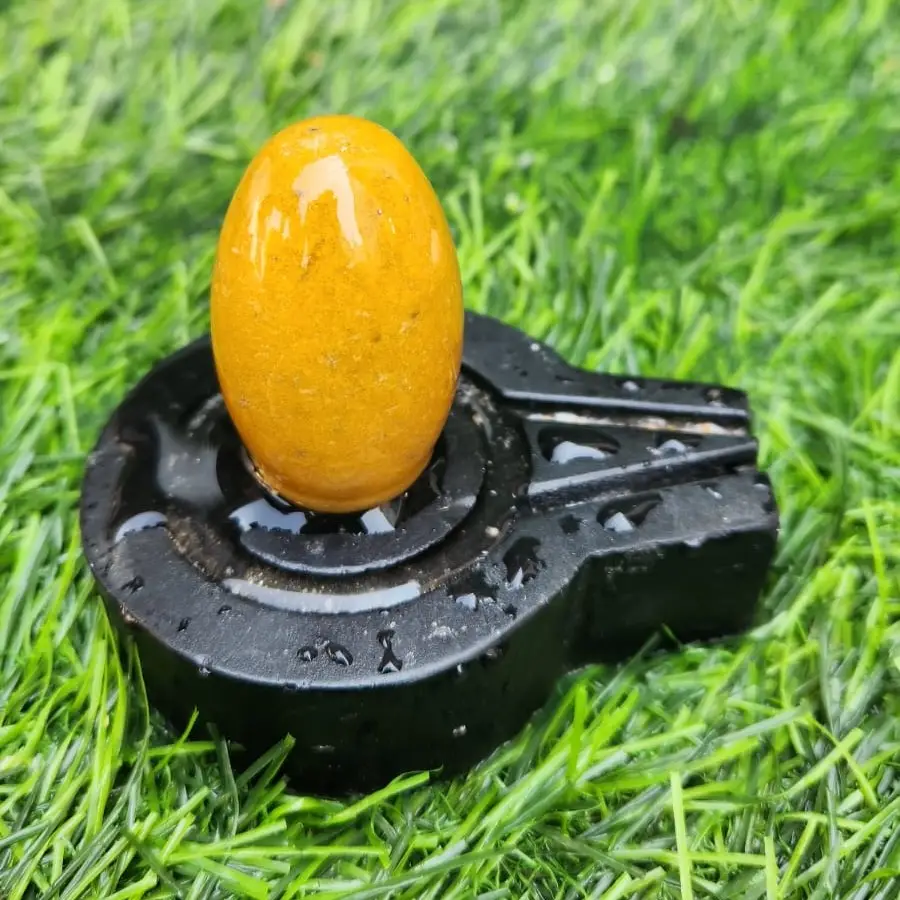 yellow-stone-shivling-with-damru-setup-narmada-stone